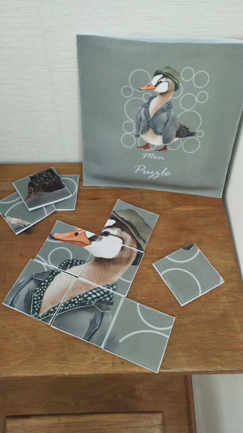 🦆 Puzzle enfant 25 pièces double face – Gaspard le Canard | Fait main en feutrine – Blanche & Noé